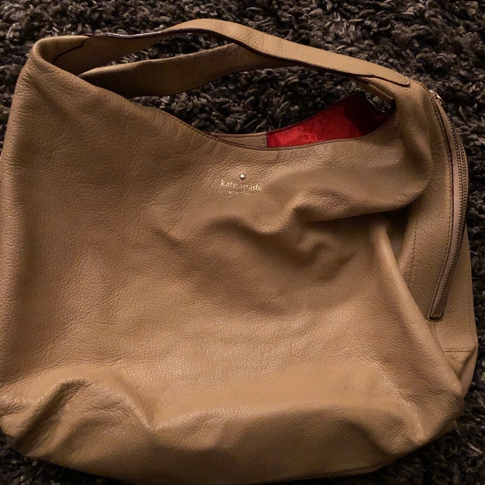 Kate Spade hobo style purse. Light tan leather